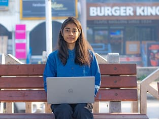 college girl using laptop